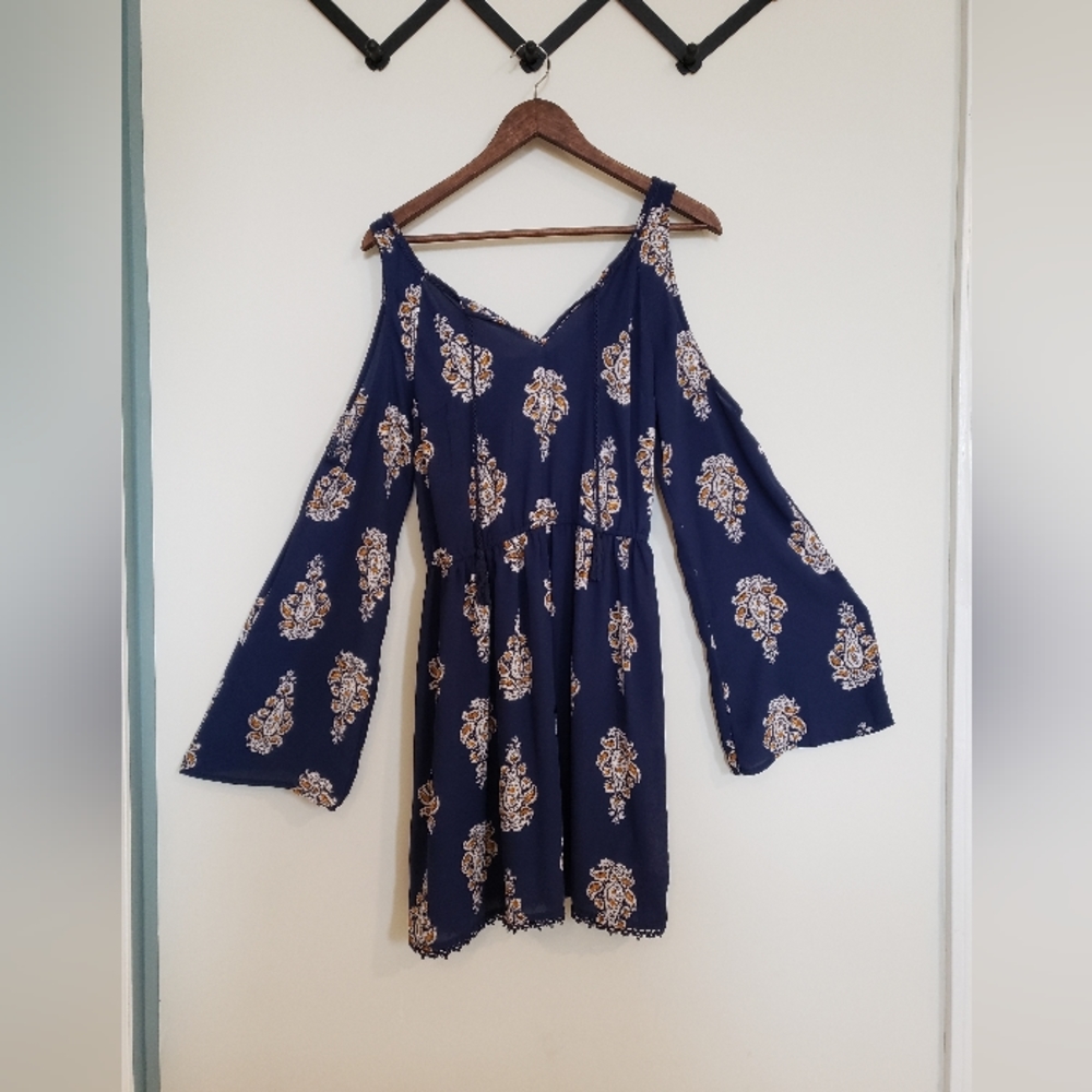 Floral, bell sleeved dress.